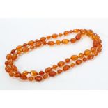 Antique amber necklace with a string of graduated faceted amber beads.