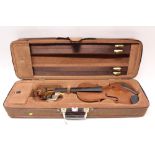 Old violin in a fitted canvas case