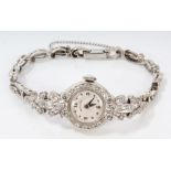 Ladies' Hamilton white gold (stamped 14k) diamond set cocktail watch with round dial,