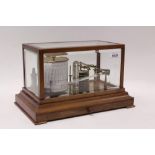 Good quality barograph by Negretti & Zambra, in mahogany and bevelled glass case,