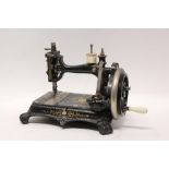 Victorian Empress sewing machine with mother of pearl and gilded decoration,