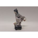 Lladro porcelain figure of a Japanese Geisha girl picking flowers, entitled - Michico,