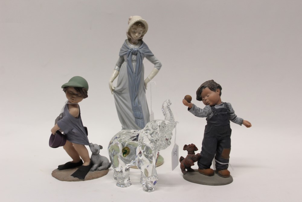 Two Elisa figures - girl with bucket and dog and boy with ball and dog, both boxed,