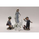 Two Elisa figures - girl with bucket and dog and boy with ball and dog, both boxed,