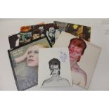 Four LP records by David Bowie - including Aladdin Sane (with Fan Club membership folder),