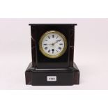 Late Victorian mantel clock with eight day timepiece movement and white enamel dial with Roman