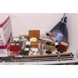 Collection of fishing equipment comprising rods, keep net, large collection of fly-tying equipment,