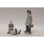 Two Lladro porcelain clown figures - one holding a violin,