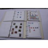Stamps - six philatelic albums containing World stamps and approximately three hundred G.B.