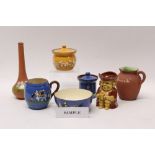 Selection of Torquay pottery items - including Widecombe Fair, Pixie Swirls, Toby jugs, Terracotta,