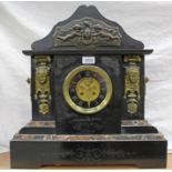 Late Victorian black slate mantel clock of large proportions,