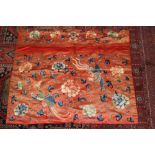Late 19th / early 20th century Chinese silk wall hanging - red silk with embroidered scrolling