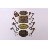 Collection of four brass safe plates,