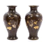 Fine pair of late 19th century Japanese bronze oviform vases with gold and silver inlaid heron and