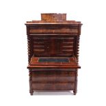 Mid-19th century Continental figured mahogany secretaire abattant surmounted by serpentine shaped