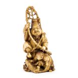 Good quality late 19th century Japanese carved ivory figure of a fisherman and child with catch,