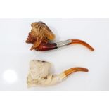 Two cased late 19th / early 20th century meerschaum pipes - both carved with Turkish heads,