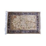Fine quality Persian silk rug depicting the Tree of Life, with fauna and flora on cream,
