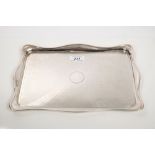 Early 1920s silver dressing table tray of rectangular form, with shaped border,