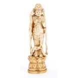 Late 19th century Chinese carved ivory figure of a goddess in tranquil pose, on lotus flower base,