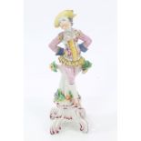 Fine 18th century Bow porcelain figure of a dancing boy in colourful clothes and painted floral