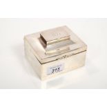 Unusual George V silver cigarette box of rectangular form,