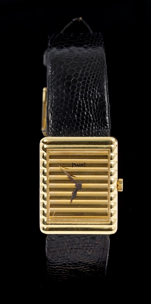 Ladies' Piaget 18ct gold wristwatch with ribbed gold dial integral to the case,