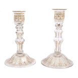 Pair 18th century gilded and cut glass candlesticks with knopped and faceted stem on bell-shaped