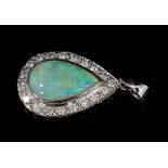 Opal and diamond pendant, the pear-shape cabochon opal measuring approximately 12mm x 7.