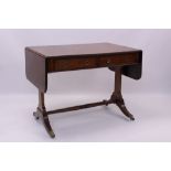19th century mahogany sofa table, the reeded drop-leaf top over two frieze drawers,