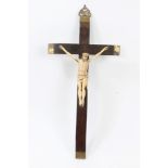 19th century French Prisoner of War carved bone crucifix, raised on wooden and brass mounted cross,