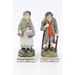 Pair early 19th century pearlware figures of elderly couple, entitled - 'Old Age',