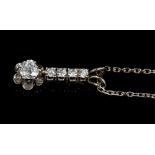 Diamond pendant with an old cut diamond in flower-shape setting,