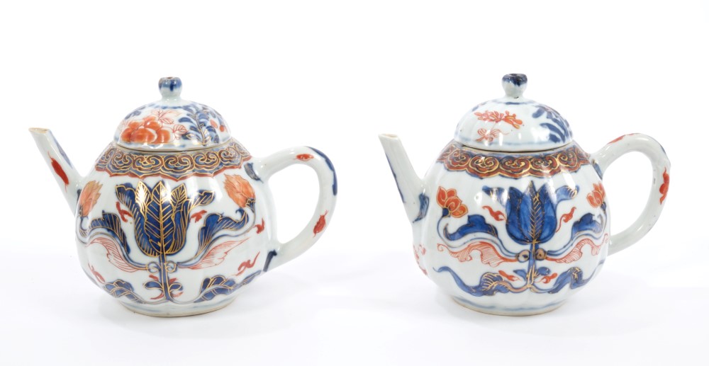 Pair early 18th century Chinese Dutch market Imari porcelain teapots and covers of fluted form,