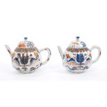 Pair early 18th century Chinese Dutch market Imari porcelain teapots and covers of fluted form,
