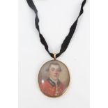 English School (mid-18th century), portrait miniature on ivory of a young military officer, oval, 3.