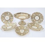 Early 19th century English part dessert service with gilt and cream leaf decoration on grey ground