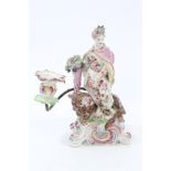 18th century Bow porcelain candlestick in the form of Ceres, emblematic of Mother Earth,