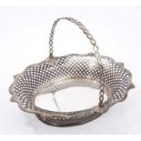 Fine quality George II silver cake basket of oval form, with pierced latticework decoration,