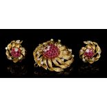 1960s Kutchinsky 18ct gold diamond and ruby pendant / brooch and matching pair of ear clips,