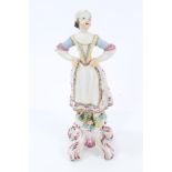 Fine 18th century Bow porcelain figure of a girl in bonnet, with hands on her hips,