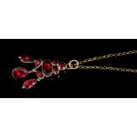 Georgian garnet pendant with pear-shape drops from further mixed cut garnets,