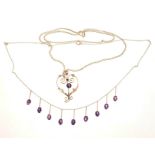 Edwardian amethyst fringe necklace with nine oval amethyst pendant drops suspended from a knife bar