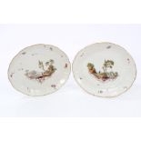 Pair 18th century Ludwigsburg oval dishes with polychrome painted Meissen-style figure in landscape