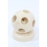 Unusual late 19th century Chinese unfinished carved ivory puzzle ball on stand,