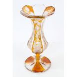 19th century Bohemian amber overlaid glass vase with floral engraved and faceted decoration,