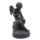 19th century Wedgwood black Jasper ware figure of seated Cupid in thoughtful pose,