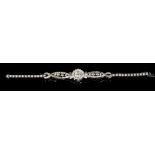 Ladies' diamond and platinum cocktail bracelet watch with Marvin seventeen jewel movement,