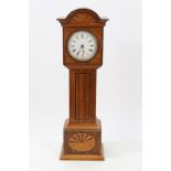 Late 19th century miniature longcase clock with circular enamel dial and cylinder movement in