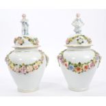 Pair late 19th century German porcelain baluster vases and covers with boy and girl knops and